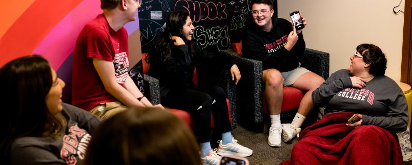 Edgewood College students gathered in the Queer Student Center on campus